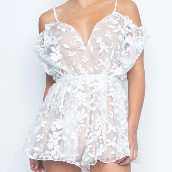 Ivory Sleeveless lcey Romper - Picture 1 of 6